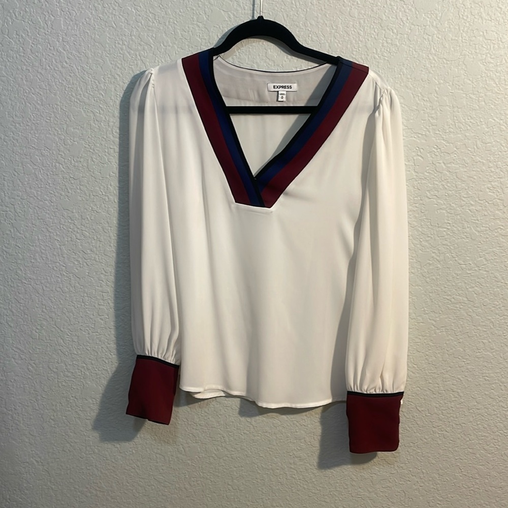Women’s M cream black, navy and burgundy trim on neckline and cuffs.